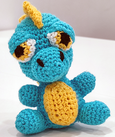 Amigurumi dinosaurio en crochet figurativo